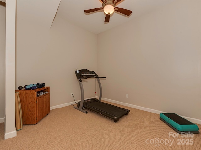 workout area featuring light carpet and ceiling fan