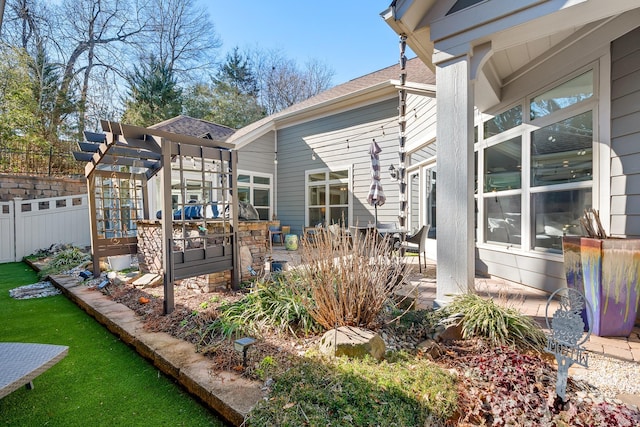 exterior space with a pergola