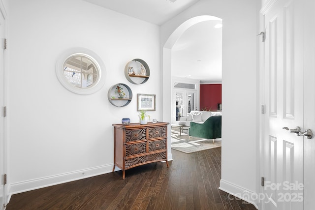 hallway featuring dark hardwood / wood-style flooring