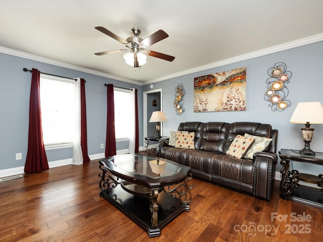 living room featuring ceiling fan, ornamental molding, and dark hardwood / wood-style flooring