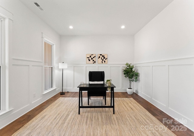 office with light hardwood / wood-style flooring