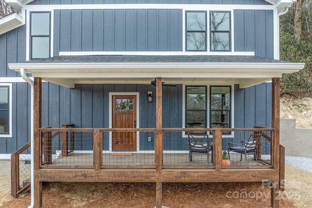 view of exterior entry with a porch