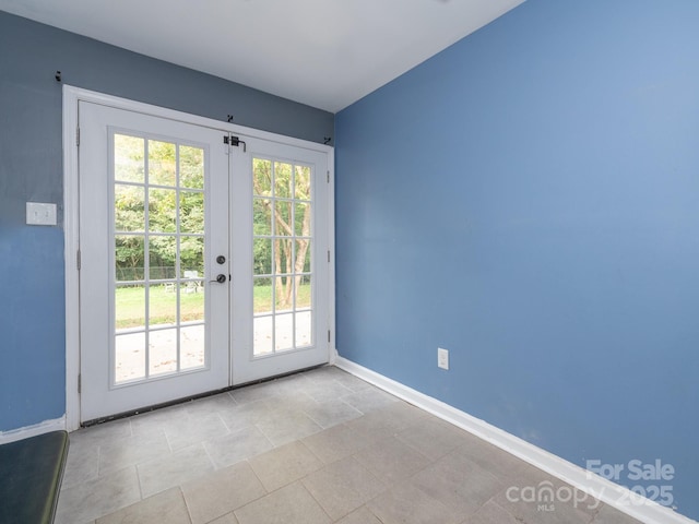 entryway featuring french doors