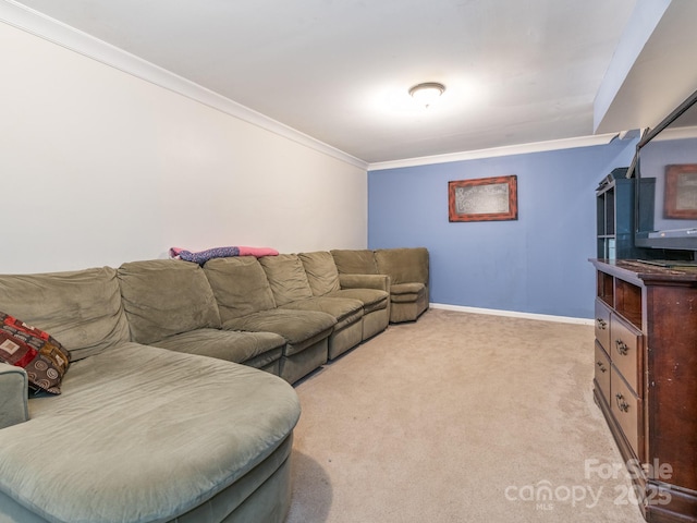 carpeted living room with ornamental molding