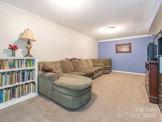 carpeted living room featuring ornamental molding