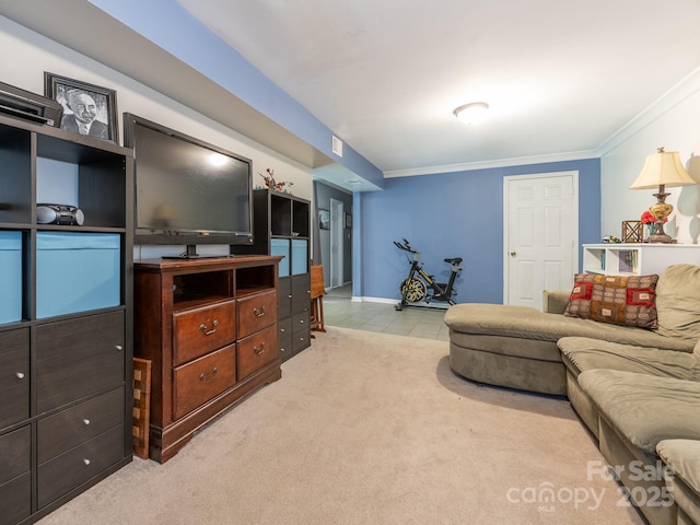 living room featuring crown molding and light carpet