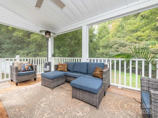 view of patio with outdoor lounge area and ceiling fan