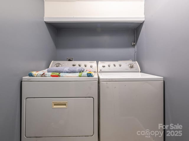 washroom featuring separate washer and dryer