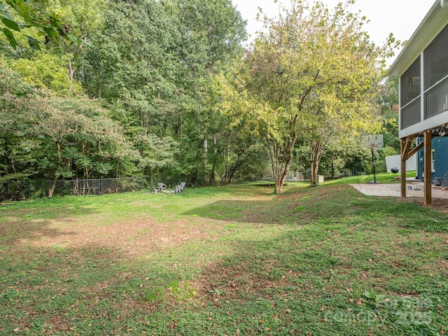 view of yard with a sunroom