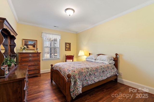 bedroom featuring ornamental molding and dark hardwood / wood-style floors