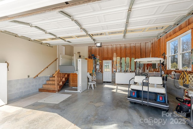 garage featuring a garage door opener