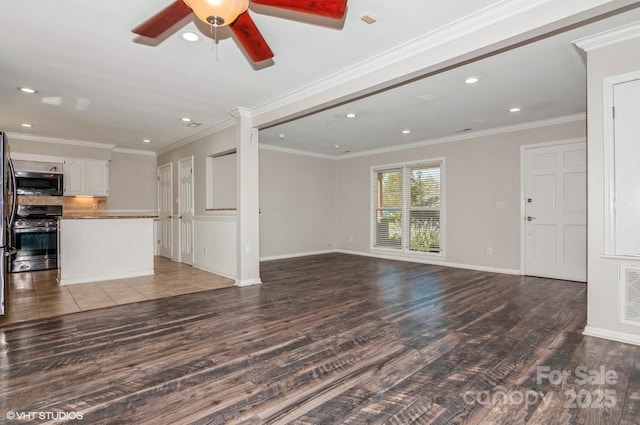 unfurnished living room featuring recessed lighting, visible vents, ornamental molding, wood finished floors, and baseboards