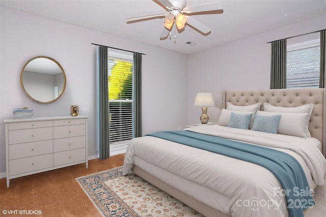 bedroom with visible vents and ceiling fan