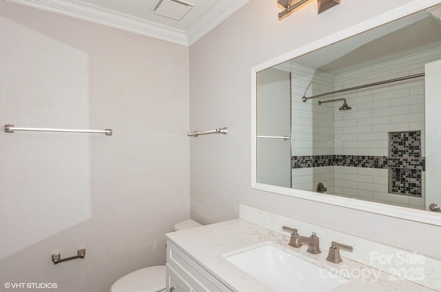 full bath featuring ornamental molding, vanity, toilet, and walk in shower