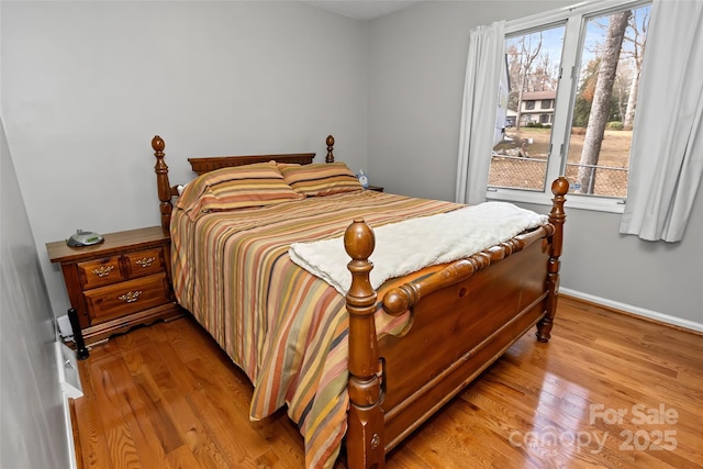 bedroom featuring light wood-type flooring