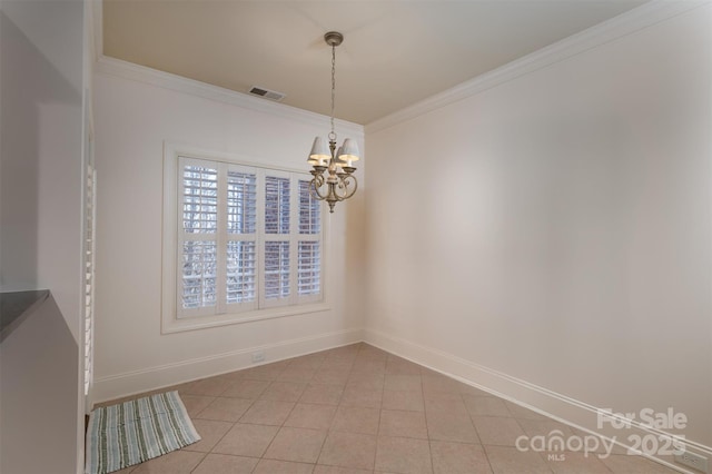 unfurnished dining area featuring ornamental molding, a chandelier, and light tile patterned floors