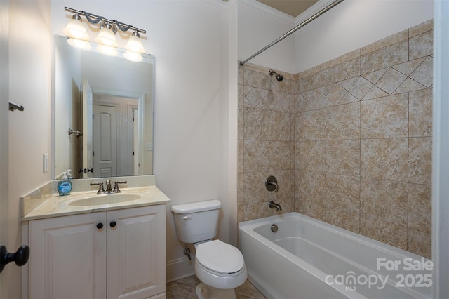 full bathroom featuring vanity, tiled shower / bath, tile patterned floors, and toilet