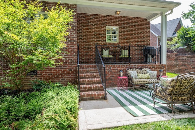 view of patio with an outdoor living space