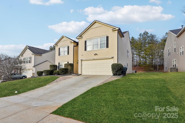 view of front property featuring a garage, a front yard, and central air condition unit