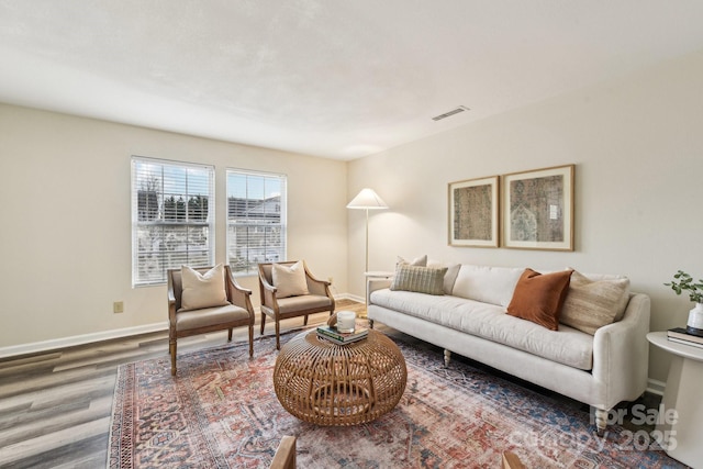 living room featuring dark hardwood / wood-style floors