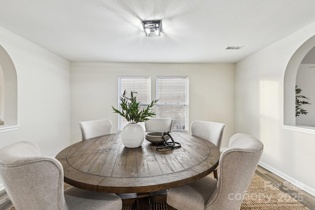 dining room featuring hardwood / wood-style flooring