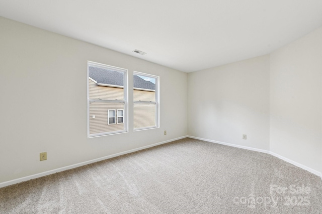 view of carpeted spare room