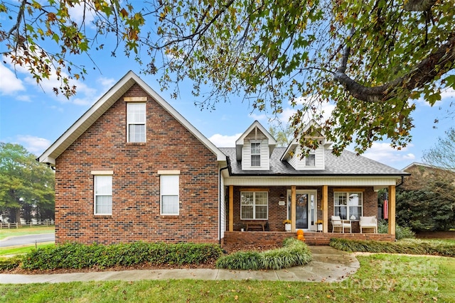 front of property featuring covered porch