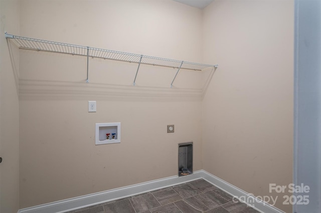 clothes washing area with washer hookup and hookup for an electric dryer