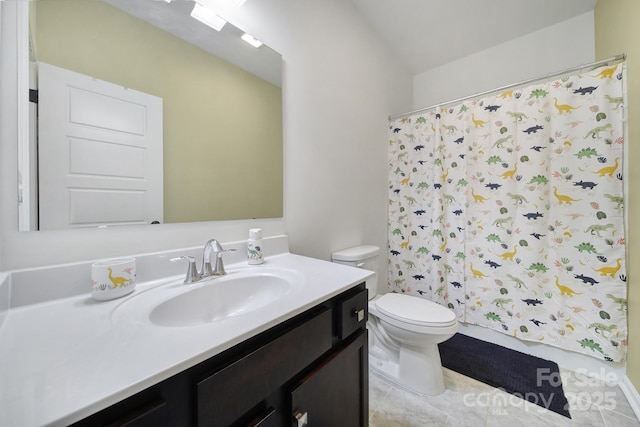 bathroom with toilet, vanity, and a shower with curtain