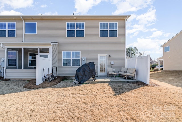 back of house featuring a patio