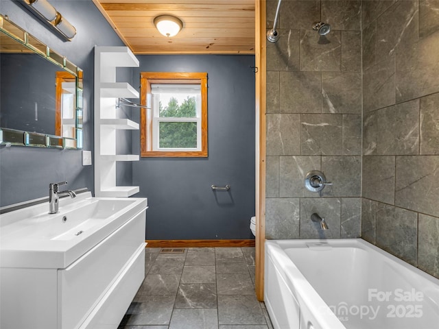 full bathroom with wood ceiling, tiled shower / bath, vanity, and toilet