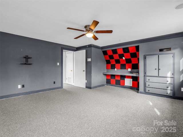 unfurnished bedroom featuring crown molding and ceiling fan