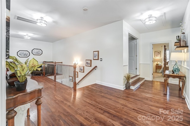 hallway featuring dark wood-type flooring