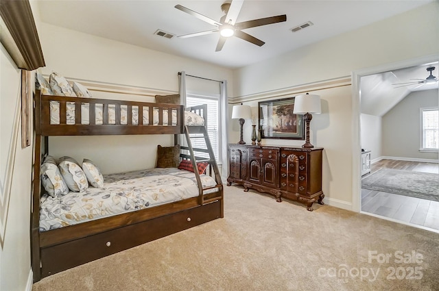 carpeted bedroom with ceiling fan