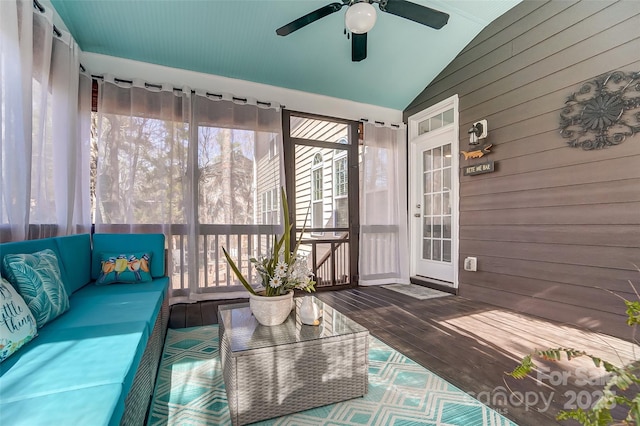 sunroom with vaulted ceiling and ceiling fan