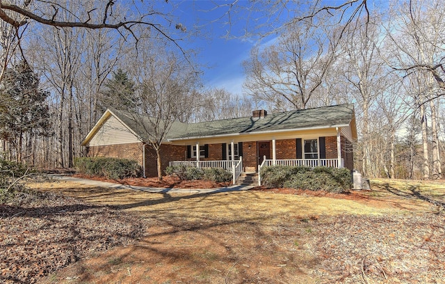 ranch-style home with covered porch