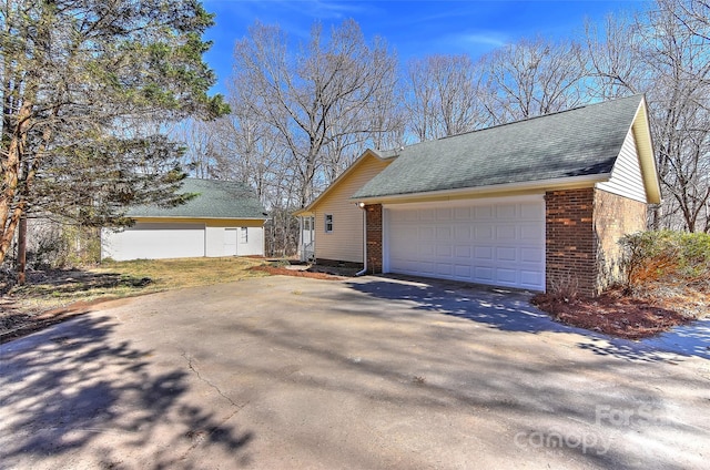 view of home's exterior featuring a garage