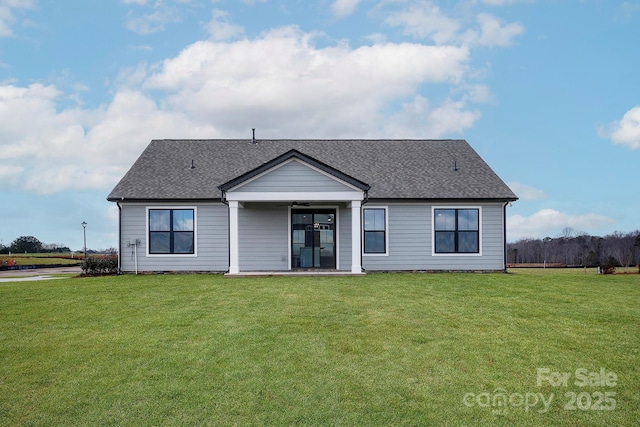 view of front of house with a front lawn