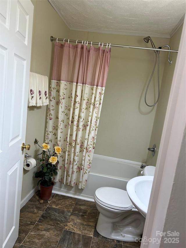 bathroom featuring toilet, shower / tub combo, and a textured ceiling