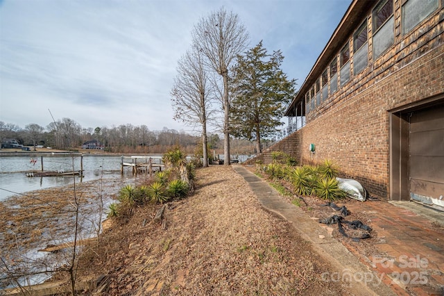 view of yard with a water view