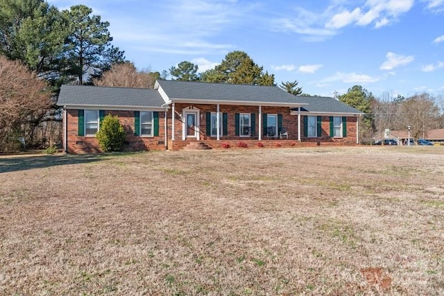 single story home featuring crawl space, brick siding, and a front lawn