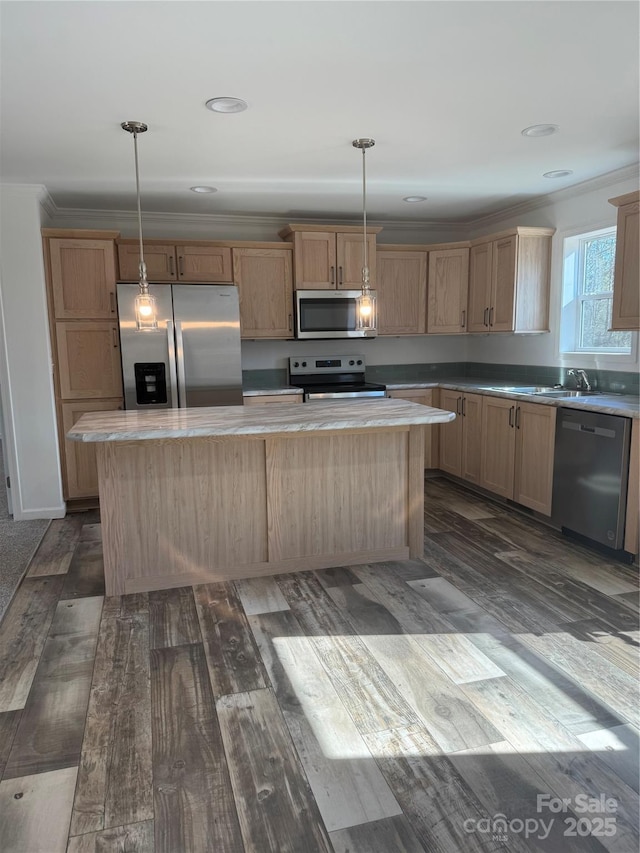 kitchen with butcher block counters, decorative light fixtures, a center island, and appliances with stainless steel finishes