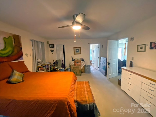 bedroom featuring ceiling fan and light colored carpet