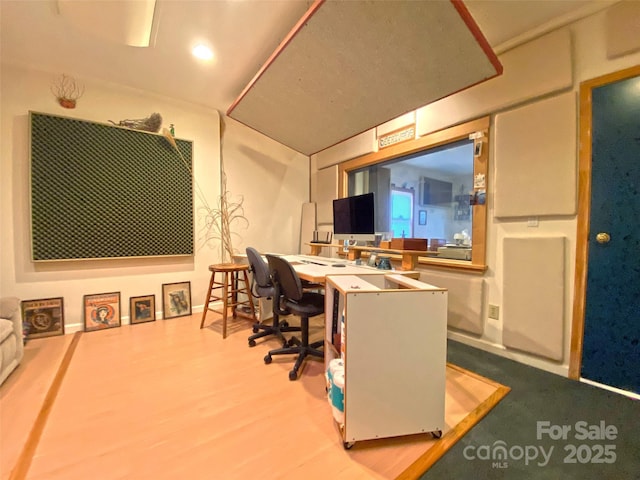 home office with wood finished floors