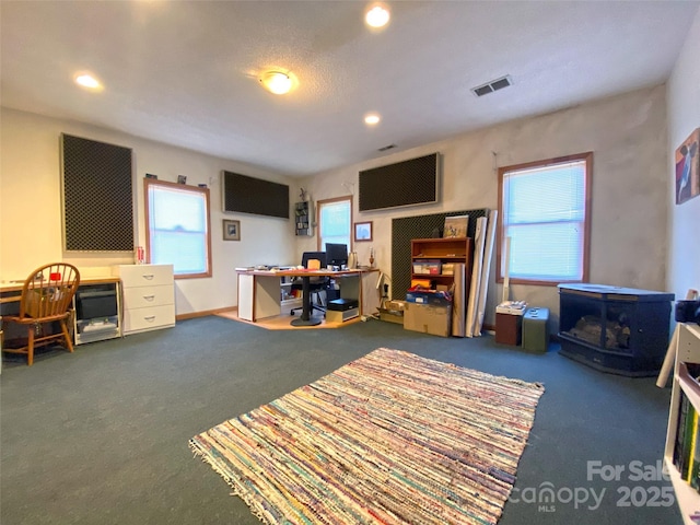 office space featuring recessed lighting and visible vents