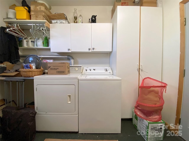 laundry area with cabinet space and washing machine and clothes dryer