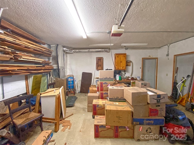 interior space featuring electric panel and a garage door opener