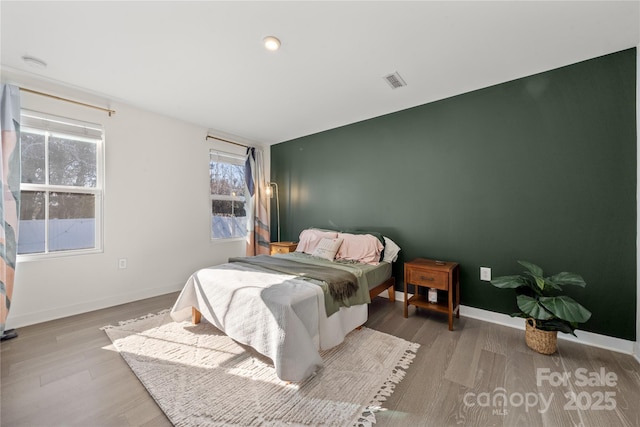 bedroom featuring light hardwood / wood-style flooring