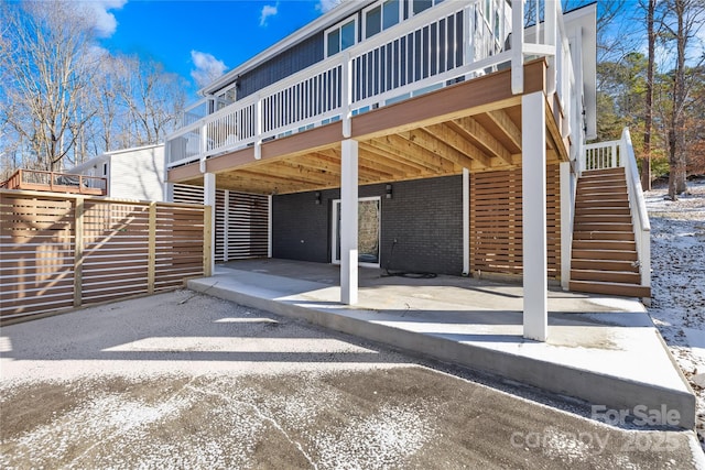 exterior space featuring a carport