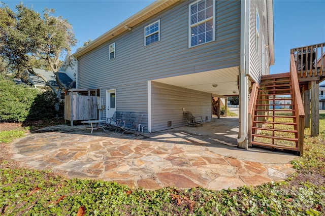 rear view of house with a patio area